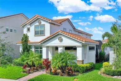 Welcome to this exquisite 4-bedroom home in the heart of Lake on Eagle Creek Golf Club in Florida - for sale on GolfHomes.com, golf home, golf lot