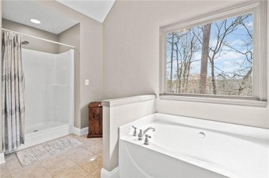 Welcome to this meticulously maintained 3-bedroom, 2-bathroom on The Highlands Course at Lake Arrowhead in Georgia - for sale on GolfHomes.com, golf home, golf lot
