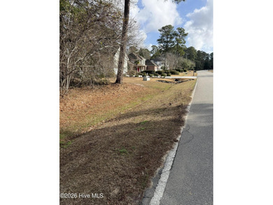 Beautiful 1/3-acre lot on the pond overlooking the fairway on #9 on Brunswick Plantation and Golf Resorts in North Carolina - for sale on GolfHomes.com, golf home, golf lot