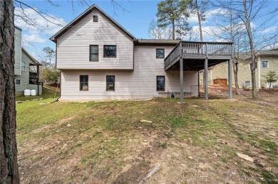 Welcome to this meticulously maintained 3-bedroom, 2-bathroom on The Highlands Course at Lake Arrowhead in Georgia - for sale on GolfHomes.com, golf home, golf lot
