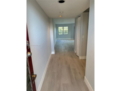 WELCOME TO THIS SPACIOUS, SPOTLESS AND BRIGHT APARTMENT. FRESHLY on Flamingo Lakes Country Club in Florida - for sale on GolfHomes.com, golf home, golf lot