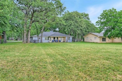 Discover your dream home on the #1 hole of Lake Kiowa's premier on Lake Kiowa Golf Course in Texas - for sale on GolfHomes.com, golf home, golf lot