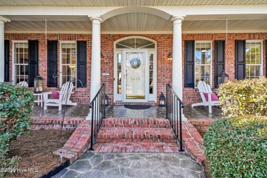 One level home situated on a lot backing to the golf course and on Magnolia Greens Golf Plantation in North Carolina - for sale on GolfHomes.com, golf home, golf lot