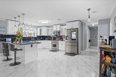 Located in beautiful Indian Bayou, this remodeled 3BR, 2BA on Indian Bayou Golf and Country Club in Florida - for sale on GolfHomes.com, golf home, golf lot