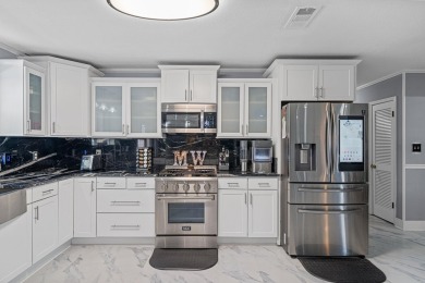 Located in beautiful Indian Bayou, this remodeled 3BR, 2BA on Indian Bayou Golf and Country Club in Florida - for sale on GolfHomes.com, golf home, golf lot