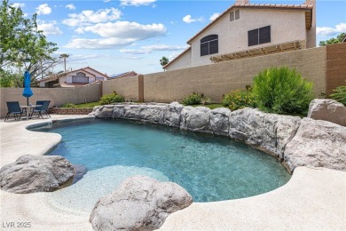 This stunning two-story residence offers 5 spacious bedrooms and on Painted Desert Golf Club in Nevada - for sale on GolfHomes.com, golf home, golf lot