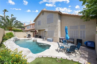 This stunning two-story residence offers 5 spacious bedrooms and on Painted Desert Golf Club in Nevada - for sale on GolfHomes.com, golf home, golf lot