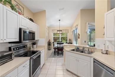 Beautifully maintained, this second-floor end-unit coach home on  in Florida - for sale on GolfHomes.com, golf home, golf lot
