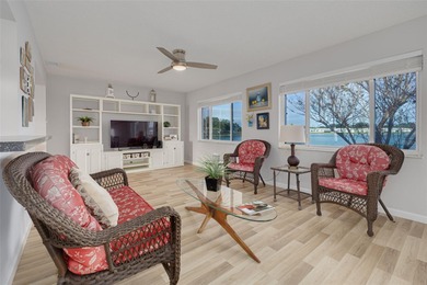 WATERFRONT LIVING IN STYLE... ENJOY YOUR NEW HOME IN THIS ACTIVE on Mainlands Golf Club in Florida - for sale on GolfHomes.com, golf home, golf lot