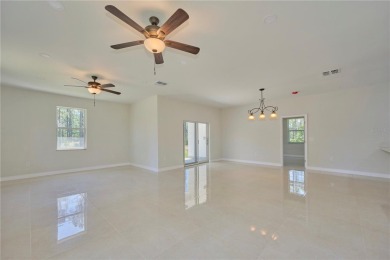 Come see the *Bella,* a gorgeous new construction home nestled on Indian Lake Estates Golf and Country Club in Florida - for sale on GolfHomes.com, golf home, golf lot