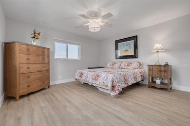 WATERFRONT LIVING IN STYLE... ENJOY YOUR NEW HOME IN THIS ACTIVE on Mainlands Golf Club in Florida - for sale on GolfHomes.com, golf home, golf lot