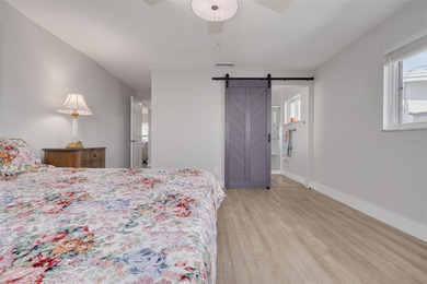 WATERFRONT LIVING IN STYLE... ENJOY YOUR NEW HOME IN THIS ACTIVE on Mainlands Golf Club in Florida - for sale on GolfHomes.com, golf home, golf lot