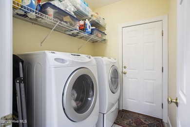 This Home 'Just Feels Right' New Roof installed July 2025 on Carolina National Golf Club in North Carolina - for sale on GolfHomes.com, golf home, golf lot