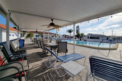 WATERFRONT LIVING IN STYLE... ENJOY YOUR NEW HOME IN THIS ACTIVE on Mainlands Golf Club in Florida - for sale on GolfHomes.com, golf home, golf lot