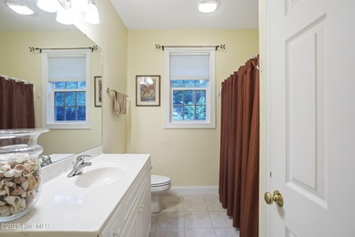 This Home 'Just Feels Right' New Roof installed July 2025 on Carolina National Golf Club in North Carolina - for sale on GolfHomes.com, golf home, golf lot