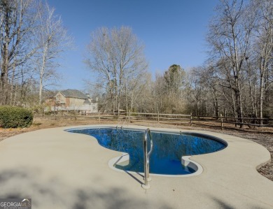 This stunning 4-bedroom, 3 full bath, and 2 half bath home on The Providence Club in Georgia - for sale on GolfHomes.com, golf home, golf lot