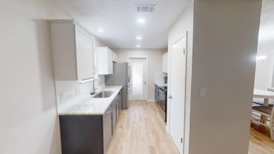 Welcome to this move-in-ready home in one of the most on Tiger Point Golf and Country Club in Florida - for sale on GolfHomes.com, golf home, golf lot