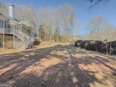 This stunning 4-bedroom, 3 full bath, and 2 half bath home on The Providence Club in Georgia - for sale on GolfHomes.com, golf home, golf lot