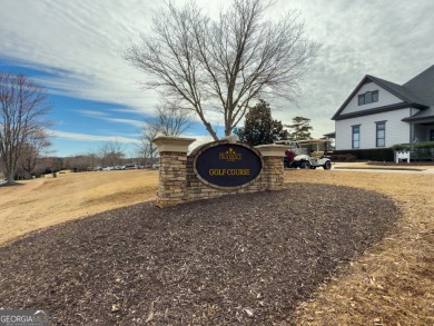 This stunning 4-bedroom, 3 full bath, and 2 half bath home on The Providence Club in Georgia - for sale on GolfHomes.com, golf home, golf lot