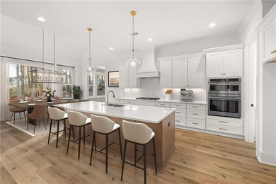 Located in the desirable Traditions of Braselton community on on Traditions of Braselton Golf Club in Georgia - for sale on GolfHomes.com, golf home, golf lot