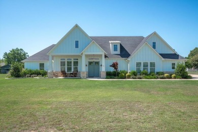 WELCOME HOME to this meticulously maintained 2020 build in the on Star Harbor Golf Club in Texas - for sale on GolfHomes.com, golf home, golf lot