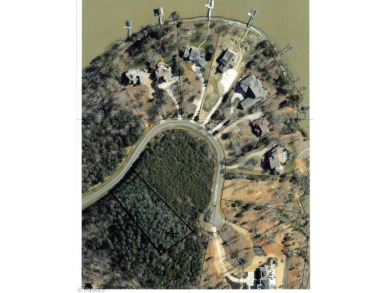 Beautiful building lot in Prestigious PRIVATE HERON BAY LAKE on Old North State Club at Uwharrie Point Golf community in North Carolina - for sale on GolfHomes.com, golf home, golf lot