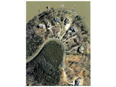Beautiful building lot in Prestigious PRIVATE HERON BAY LAKE on Old North State Club at Uwharrie Point Golf community in North Carolina - for sale on GolfHomes.com, golf home, golf lot