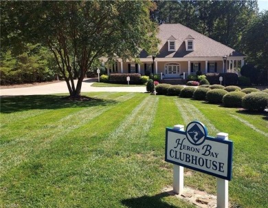 Beautiful building lot in Prestigious PRIVATE HERON BAY LAKE on Old North State Club at Uwharrie Point Golf community in North Carolina - for sale on GolfHomes.com, golf home, golf lot