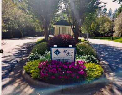 Beautiful building lot in Prestigious PRIVATE HERON BAY LAKE on Old North State Club at Uwharrie Point Golf community in North Carolina - for sale on GolfHomes.com, golf home, golf lot