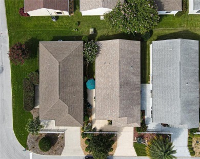 BOND PAID AND MOVE IN READY!  THIS DARLING COLONY PATIO VILLA on Roosevelt Executive Golf Course in Florida - for sale on GolfHomes.com, golf home, golf lot