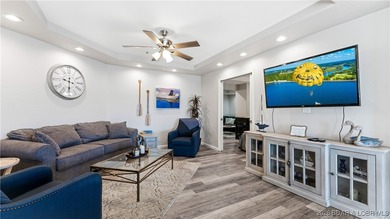 Enjoy incredible lake views from this spacious 4-bedroom, 3-bath on Tan-Tar-A Golf Club in Missouri - for sale on GolfHomes.com, golf home, golf lot