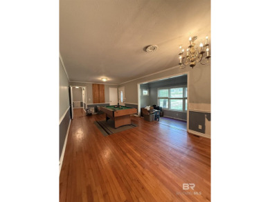 Charming 3-bedroom, 2-bath home conveniently located in town on Vanity Fair Golf and Tennis Club in Alabama - for sale on GolfHomes.com, golf home, golf lot