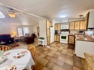 Home is located in Water Oak Country Club Estates in Lady Lake on Water Oak Country Club Estates in Florida - for sale on GolfHomes.com, golf home, golf lot