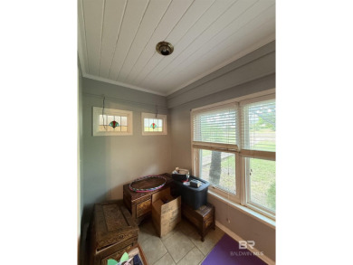 Charming 3-bedroom, 2-bath home conveniently located in town on Vanity Fair Golf and Tennis Club in Alabama - for sale on GolfHomes.com, golf home, golf lot