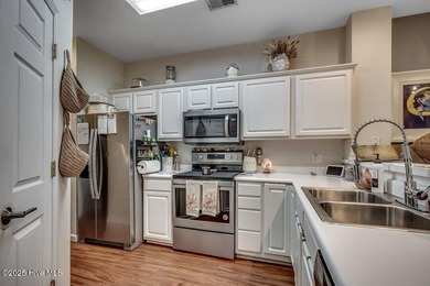 Updated and renovated, 2 bedroom, 2 bathroom, second floor, end on Sandpiper Bay Golf and Country Club in North Carolina - for sale on GolfHomes.com, golf home, golf lot