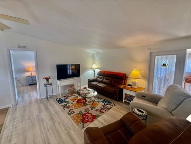 Home is located in Water Oak Country Club Estates in Lady Lake on Water Oak Country Club Estates in Florida - for sale on GolfHomes.com, golf home, golf lot