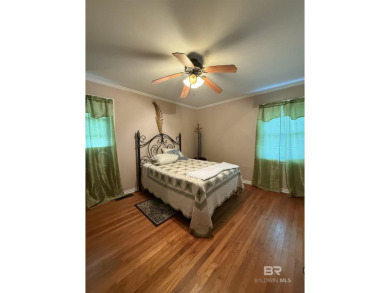 Charming 3-bedroom, 2-bath home conveniently located in town on Vanity Fair Golf and Tennis Club in Alabama - for sale on GolfHomes.com, golf home, golf lot