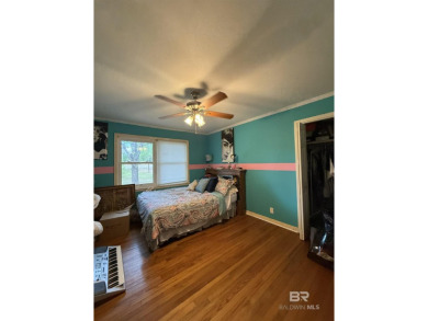 Charming 3-bedroom, 2-bath home conveniently located in town on Vanity Fair Golf and Tennis Club in Alabama - for sale on GolfHomes.com, golf home, golf lot