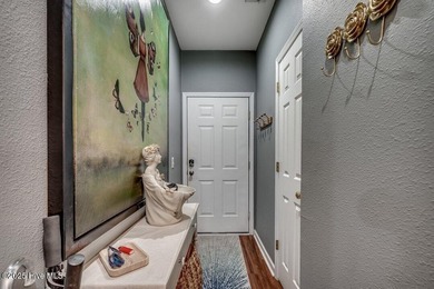 Updated and renovated, 2 bedroom, 2 bathroom, second floor, end on Sandpiper Bay Golf and Country Club in North Carolina - for sale on GolfHomes.com, golf home, golf lot