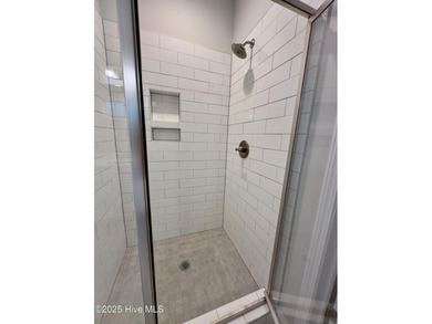 This stunning new 4-bedroom, 2.5-bath home in the gated Woodlake on Woodlake Country Club in North Carolina - for sale on GolfHomes.com, golf home, golf lot