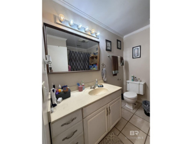 Charming 3-bedroom, 2-bath home conveniently located in town on Vanity Fair Golf and Tennis Club in Alabama - for sale on GolfHomes.com, golf home, golf lot