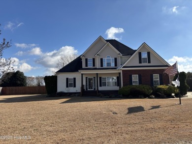 This custom-built 4-bedroom, 3-bathroom home at 106 Glasgow Lane on Walnut Creek Country Club in North Carolina - for sale on GolfHomes.com, golf home, golf lot