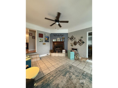 Charming 3-bedroom, 2-bath home conveniently located in town on Vanity Fair Golf and Tennis Club in Alabama - for sale on GolfHomes.com, golf home, golf lot