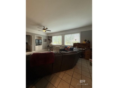 Charming 3-bedroom, 2-bath home conveniently located in town on Vanity Fair Golf and Tennis Club in Alabama - for sale on GolfHomes.com, golf home, golf lot