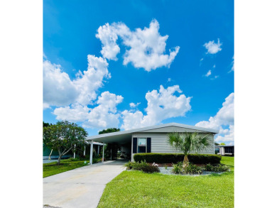 This beautiful two-bedroom, two-bath home is located in the on Pine Lakes Country Club in Florida - for sale on GolfHomes.com, golf home, golf lot