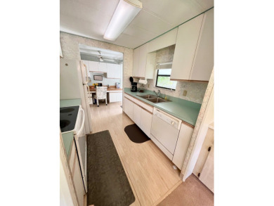 This beautiful two-bedroom, two-bath home is located in the on Pine Lakes Country Club in Florida - for sale on GolfHomes.com, golf home, golf lot