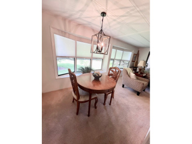 This beautiful two-bedroom, two-bath home is located in the on Pine Lakes Country Club in Florida - for sale on GolfHomes.com, golf home, golf lot