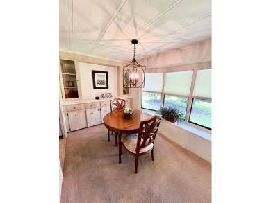 This beautiful two-bedroom, two-bath home is located in the on Pine Lakes Country Club in Florida - for sale on GolfHomes.com, golf home, golf lot
