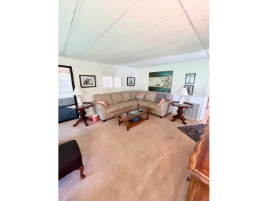 This beautiful two-bedroom, two-bath home is located in the on Pine Lakes Country Club in Florida - for sale on GolfHomes.com, golf home, golf lot