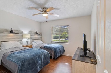 Grab a drink of your choice, head to the lanai and watch the on Royal Wood Golf and Country Club in Florida - for sale on GolfHomes.com, golf home, golf lot